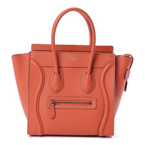 CELINE Drummed Calfskin Micro Luggage Vermillion.